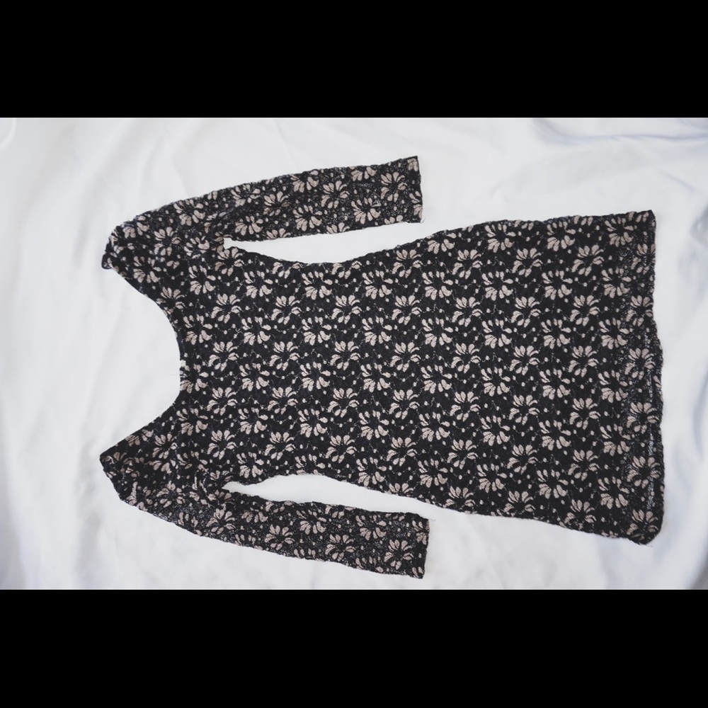 Black dress with beige flowers